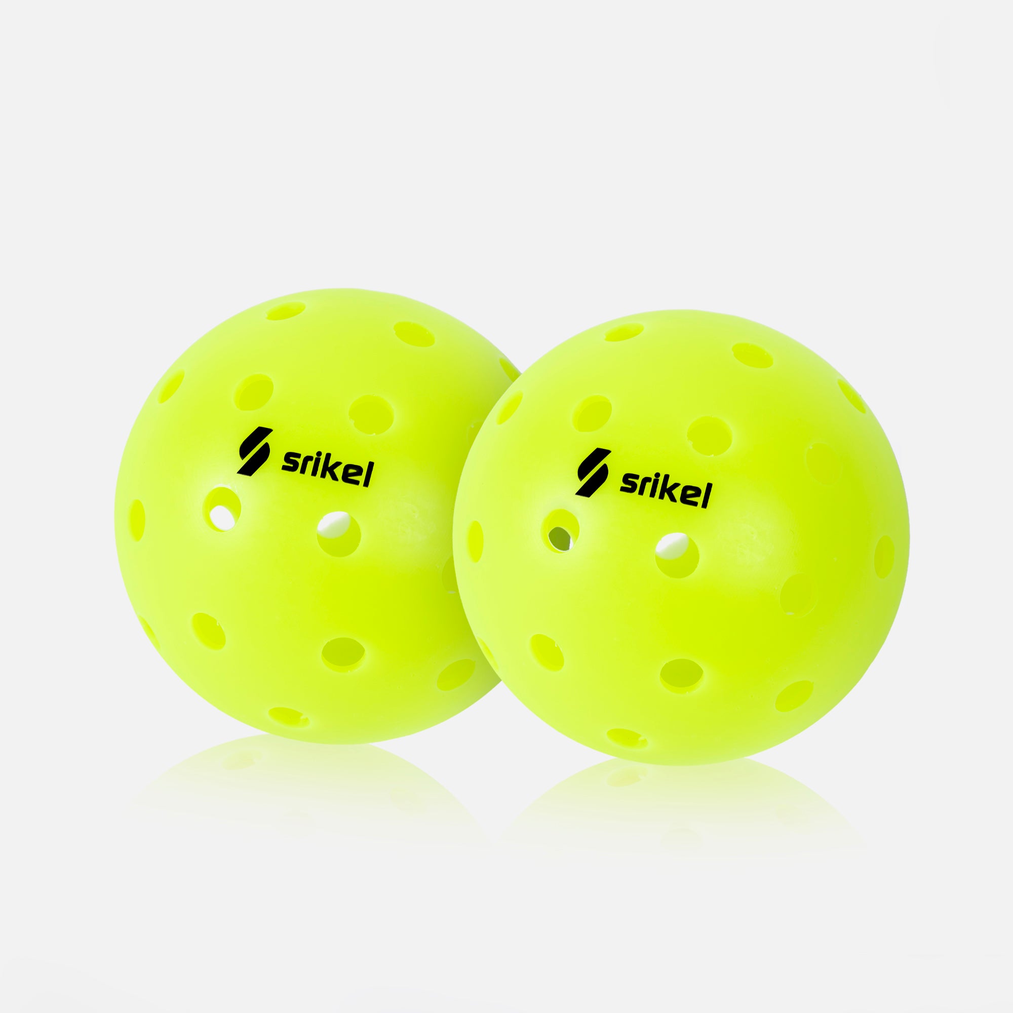 Two green color XS-40 Outdoor Pickleball Balls